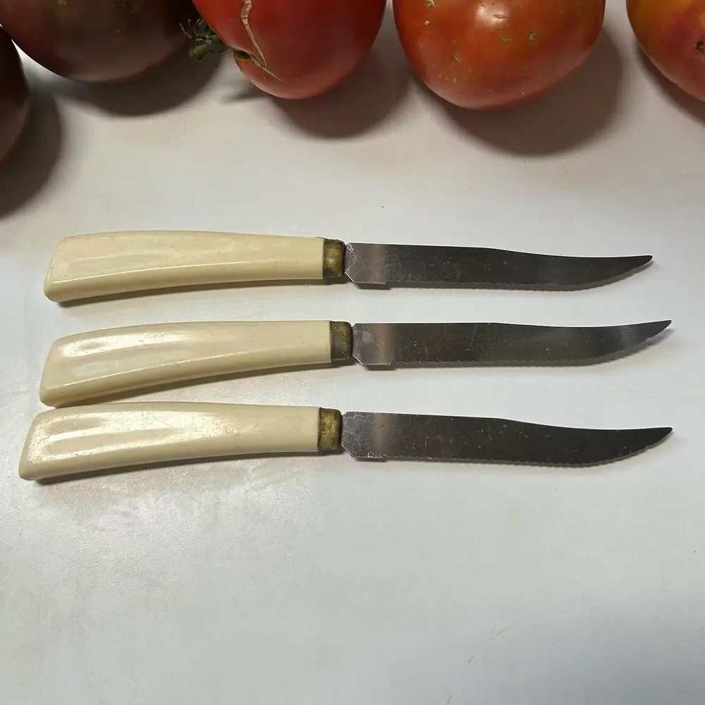 Vintage Quikut Quikkle serrated steak knives cream color handles Set Of 3 Used
